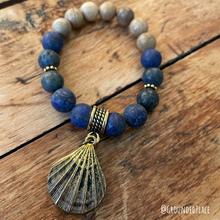 Load image into Gallery viewer, Diffuser Bracelet - 100% Natural Sandalwood &amp; Matte Lapis with Shell Charm - Handmade 7&quot; Slip-on
